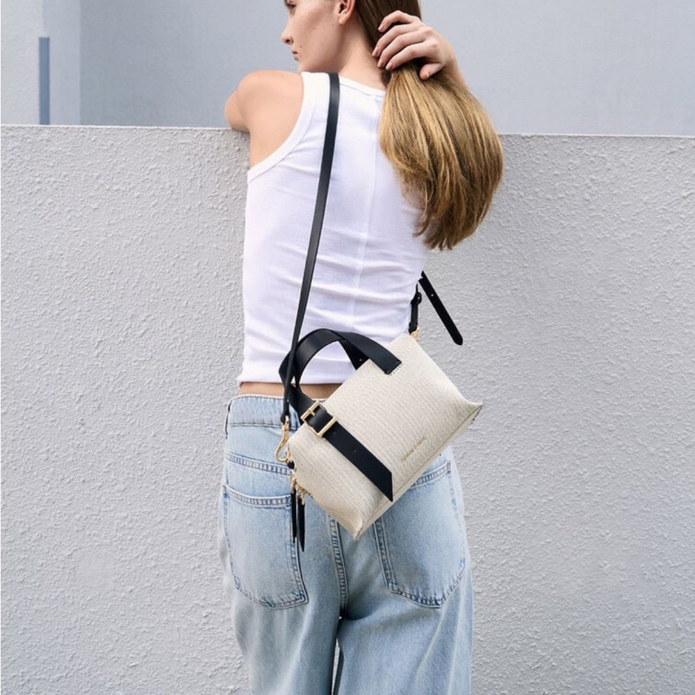 Charles & Keith Elegant Black and Cream canvas Satchel with shoulder strap - Picture 4 of 8